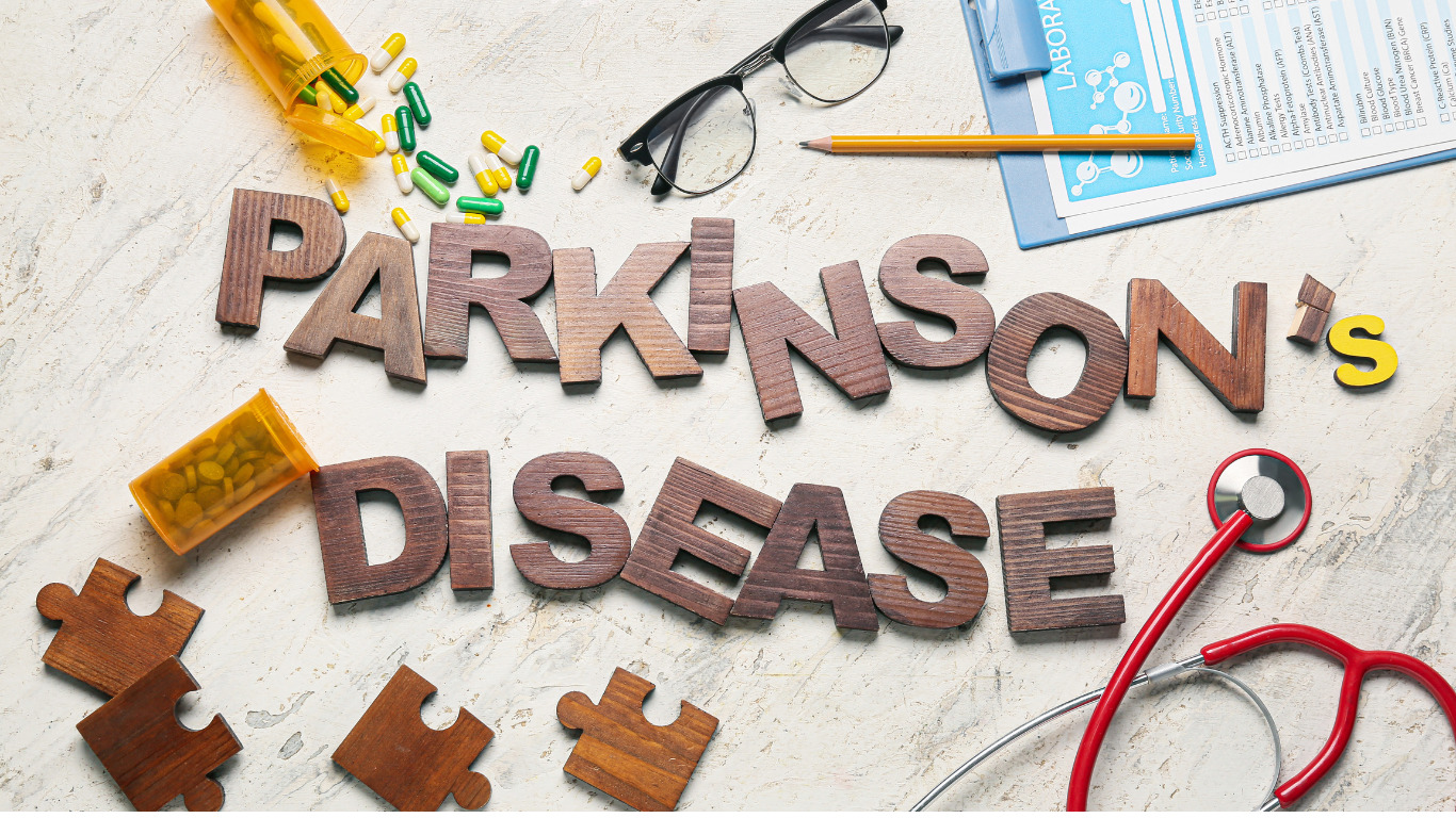 What are the genetic and environmental factors that are linked to Parkinson's disease